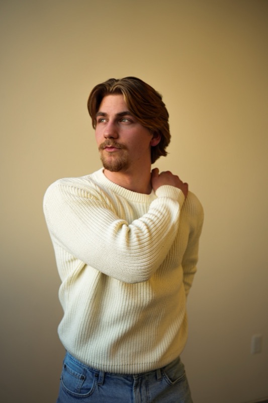 Portrait in a cream sweater